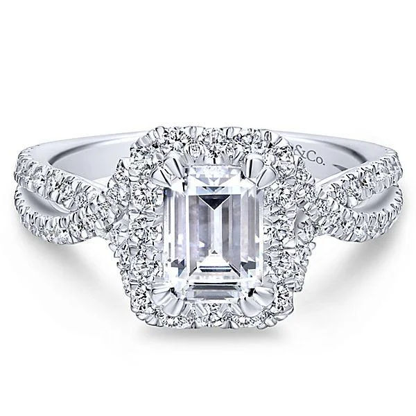 Engagement rings with innovative designs featuring tension or floating diamond settings -Emerald Cut Crossover Shank Halo Diamond Ring .69 Cttw 382A