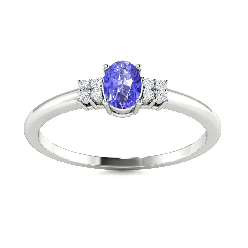 Engagement rings with three-stone settings symbolizing past, present, and future love -14KT Gold Oval Brilliant Tanzanite and Diamond Ring (Tanzanite 0.30 cts. White Diamonds 0.04 cts.)