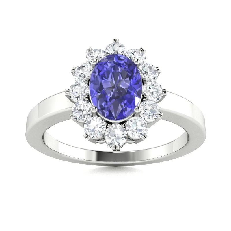 Non-diamond engagement rings with alternative gemstones like moissanite or aquamarine -14KT Gold Oval Brilliant Tanzanite and Diamond Ring (Tanzanite 0.75 cts. White Diamond 0.30 cts.)