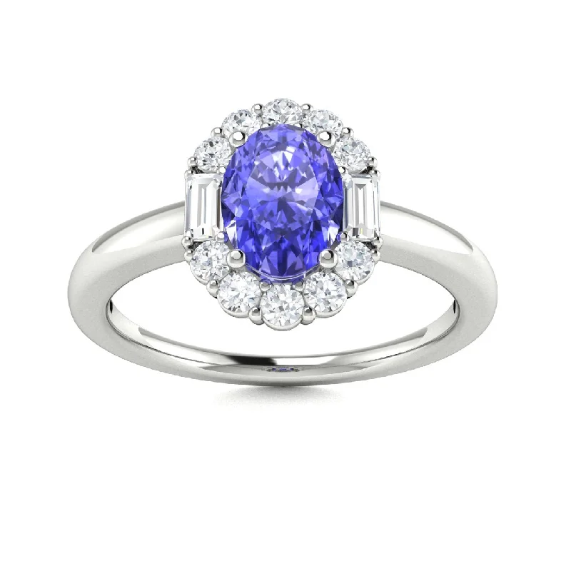 Engagement rings with innovative designs featuring tension or floating diamond settings -14KT Gold Oval Brilliant Tanzanite and Diamond Ring (Tanzanite 0.90 cts. White Diamonds 0.28 cts.)