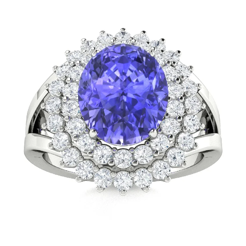 Alternative engagement rings with black diamonds for a bold and edgy look -14KT Gold Oval Brilliant Tanzanite and Diamond Ring (Tanzanite 1.25 ct. White Diamonds 0.25 cts.)