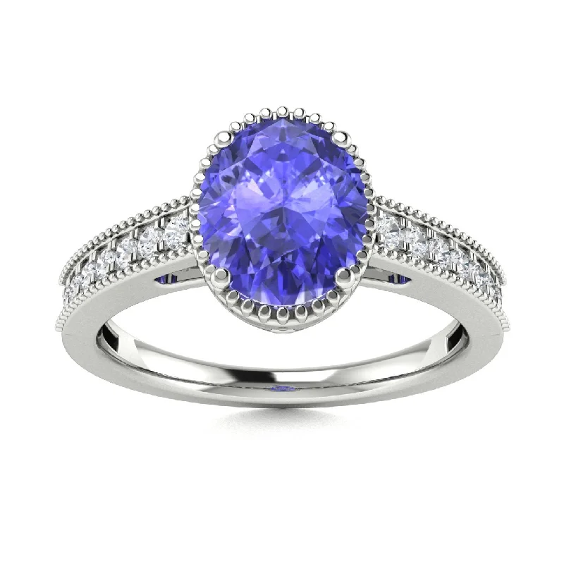 Engagement rings with floral-inspired settings for a romantic and delicate feel -14KT Gold Oval Brilliant Tanzanite and Diamond Ring (Tanzanite 1.25 cts. White Diamond 0.15 cts.)