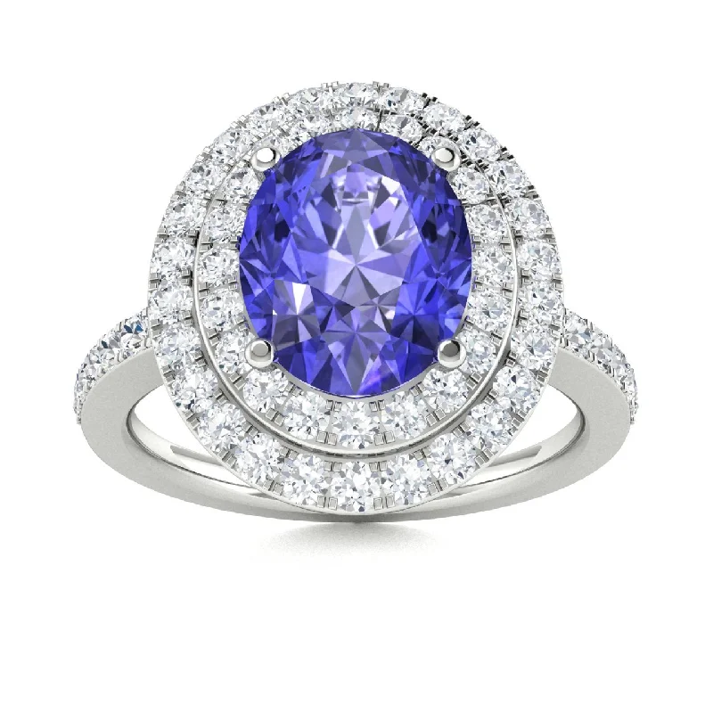 Engagement rings with antique-style settings and old European cuts for vintage charm -14kt Gold Oval brilliant Tanzanite and Diamond Ring (Tanzanite 1.50 cts. Diamonds 0.60 cts.)