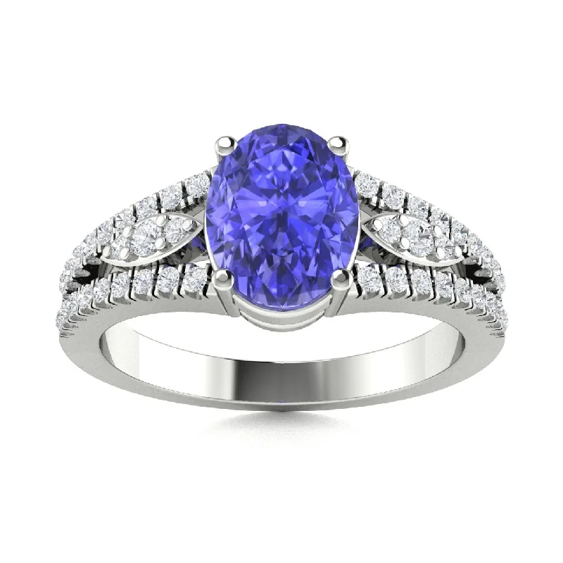 Vintage-inspired engagement rings with ornate detailing and romantic designs -14KT Gold Oval Brilliant Tanzanite and Diamond Ring (Tanzanite 1.50 cts. White Diamond 0.25 cts.)