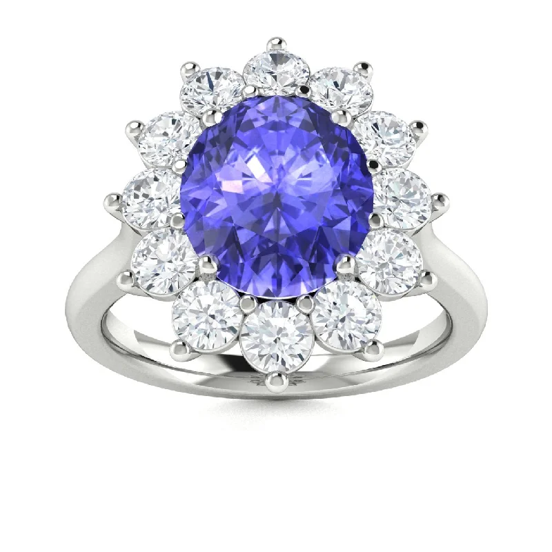 Luxury engagement rings with platinum settings for high-end, premium quality -14KT Gold Oval Brilliant Tanzanite and Diamond Ring (Tanzanite 1.60 cts. White Diamond 0.90 cts.)