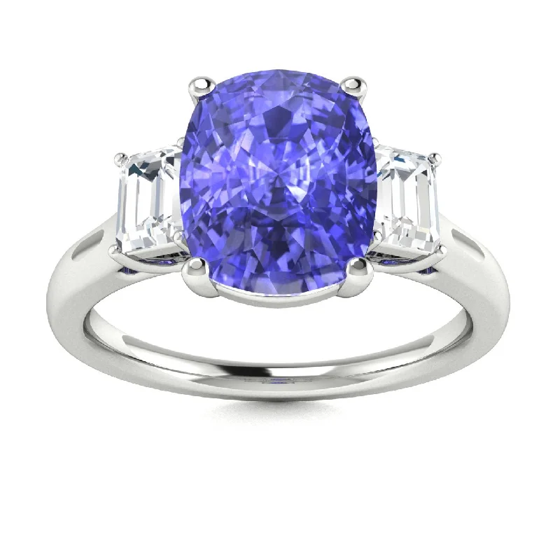 Custom engagement rings with diamond side stones for added sparkle and elegance -14KT Gold Oval Brilliant Tanzanite and Diamond Ring (Tanzanite 2.00 cts. White Diamonds 0.25 cts.)