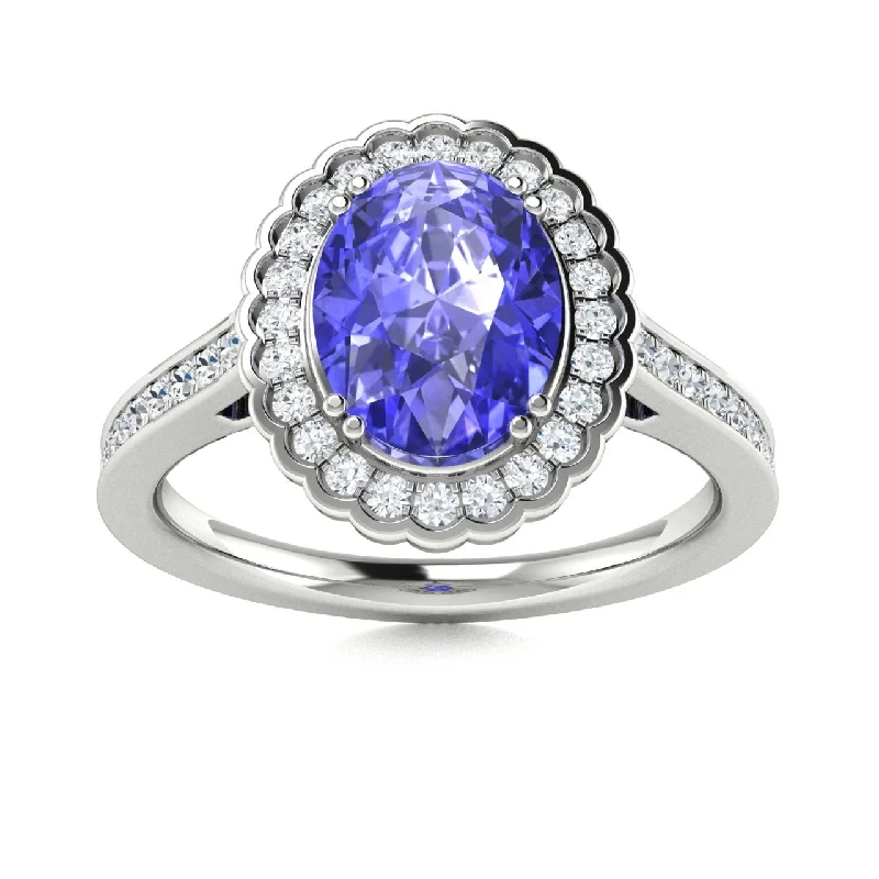 Engagement rings with twisted band designs for a contemporary and unique look -14Kt Gold Oval Brilliant Tanzanite and Diamond Ring (Tanzanite 2.00 cts. White Diamonds 0.25 cts.)