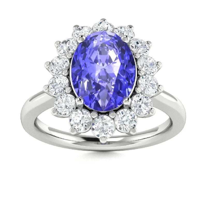 Modern engagement rings with tension settings for a sleek, floating look -14KT Gold Oval Tanzanite and Diamond Ring (Tanzanite 2.25 cts. White Diamonds 0.50 cts.)