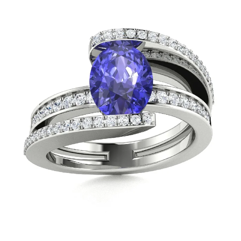 Rose gold engagement rings with romantic tones and vintage-inspired designs -14kt Gold Oval shaped Tanzanite and Diamond Ring (Tanzanite 1.50 cts. Diamonds 0.30 cts.)