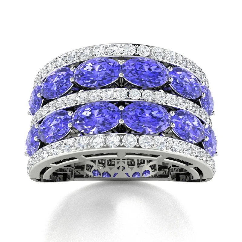 Engagement rings with intricate filigree work for a vintage-inspired, detailed design -14KT Gold Oval Tanzanite and Diamond Ring (Tanzanite 3.50 cts. White Diamond0.75 cts.)