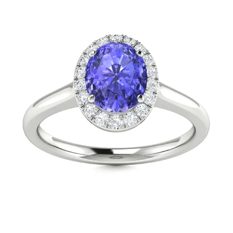 Engagement rings with innovative designs featuring tension or floating diamond settings -14kt Gold Oval Tanzanite and Diamond Ring (Tanzanite 0.70ct Diamonds 0.20 cts)