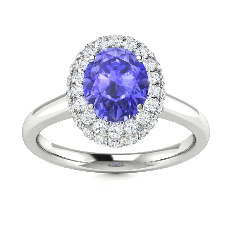 Custom engagement rings with meaningful symbols and shapes representing love, faith, or family -14kt Gold Oval Tanzanite and Diamond Ring (Tanzanite 1.00ct Diamonds 0.40 cts)