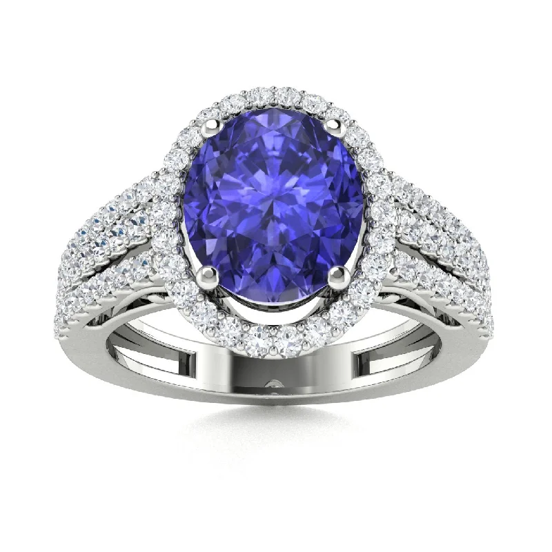 Engagement rings with colored diamonds for a bold and vibrant alternative to traditional diamonds -14kt Gold Oval Tanzanite and Diamond Ring (Tanzanite 2.00ct Diamonds 1.00 cts)