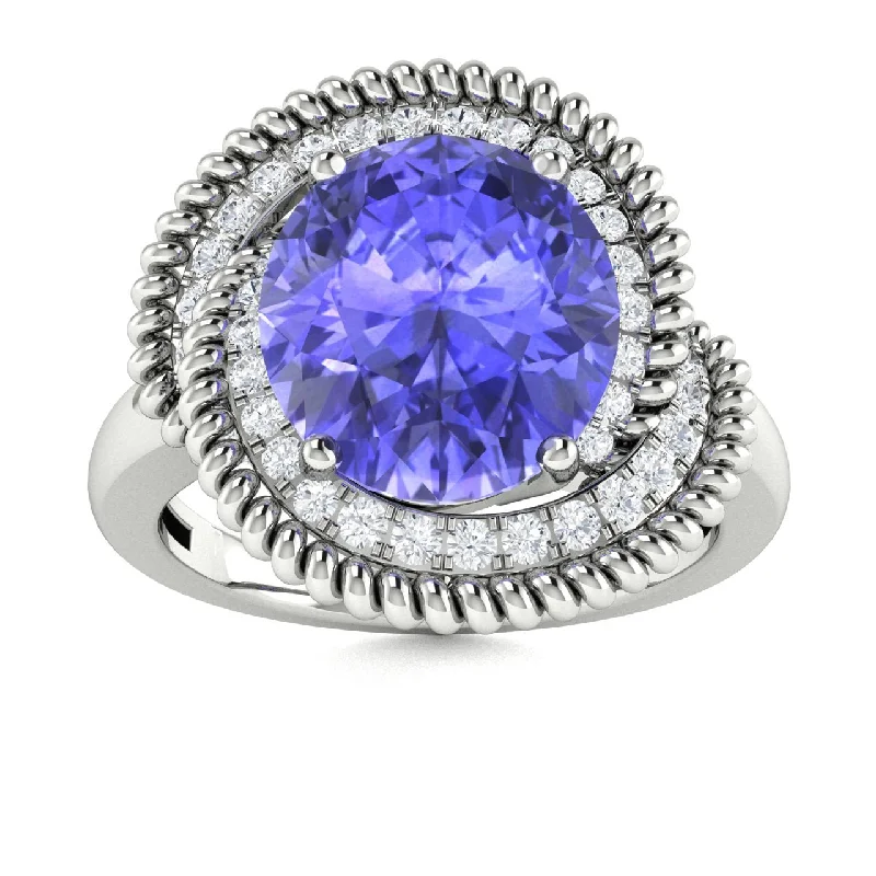 Engagement rings with platinum bands for a hypoallergenic, durable, and luxurious option -14KT Gold Oval Tanzanite and Diamond Ring (Tanzanite 3.00 cts. White Diamond 0.25 cts.)