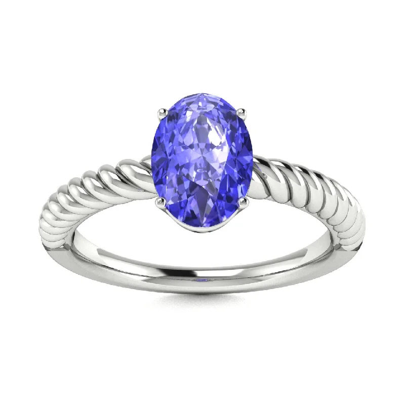 Affordable engagement rings with moissanite stones for a diamond-like alternative -14KT Gold Oval Tanzanite Ring (Tanzanite 1.40 cts.)