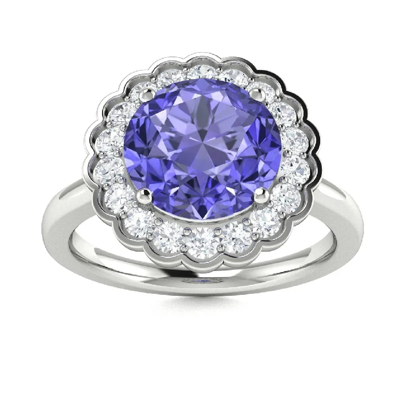 Three-stone engagement rings with diamonds and colored gemstones for a vibrant, meaningful look -14kt Gold Round brilliant cut Tanzanite and Diamond Ring (Tanzanite 1.00 cts. Diamonds 0.30 cts.)