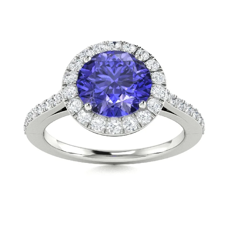 Modern engagement rings with minimalistic designs for couples who love simplicity -14Kt Gold Round Brilliant Cut Tanzanite and Diamond Ring (Tanzanite 1.50 cts. White Diamonds 0.40 cts.)