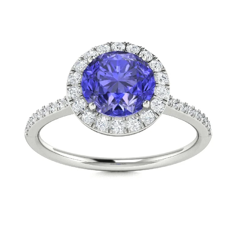 Engagement rings with diamond sidestones for added brilliance and a modern touch -14KT Gold Round Brilliant Tanzanite and Diamond Ring (Tanzanite 0.90 cts. White Diamond 0.20 cts.)