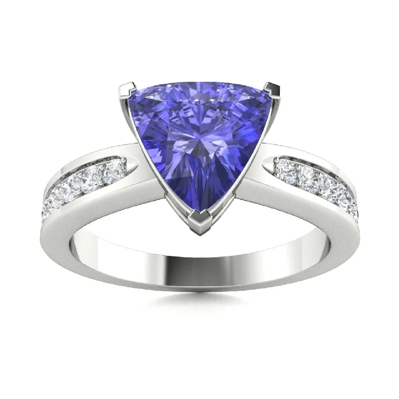 Unique engagement rings with halo diamonds around the center stone for radiance -14KT Gold Triangle Tanzanite and Diamond Ring (Tanzanite 2.25 cts. White Diamond 0.20 cts.)