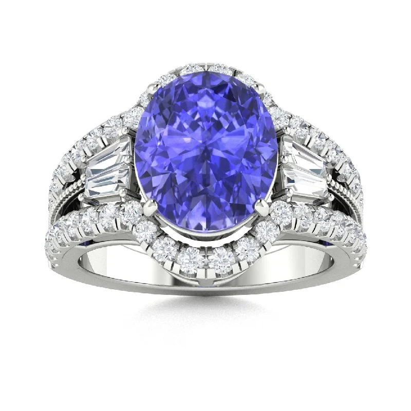 Custom engagement rings with diamond side stones for added sparkle and elegance -18kt Gold AAA Deep  Purple Oval Brilliant Tanzanite and Diamond Ring (Tanzanite 7.00ct Diamonds 1.00cts)