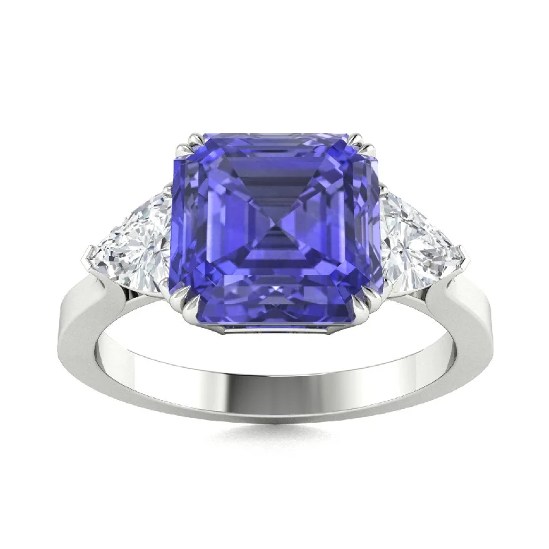 Modern engagement rings with sapphire accents for added color and elegance -18kt Gold Asscher Cut Tanzanite and Diamond Ring (Tanzanite 1.50ct Diamonds 0.25cts)