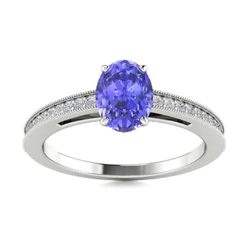 Engagement rings with rose gold bands for a romantic and warm look -18kt Gold Oval brilliant Tanzanite and Diamond Ring (Tanzanite 1.50ct Diamonds 0.20cts)