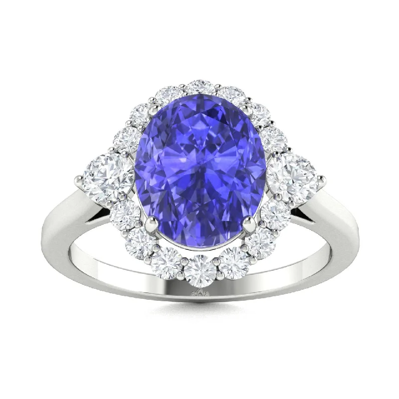 Vintage engagement rings with antique diamond cuts for a timeless and heirloom-worthy piece -18kt Gold Oval Shaped AAA Tanzanite and Diamond Ring (Tanzanite 1.20ct Diamonds 0.25cts)