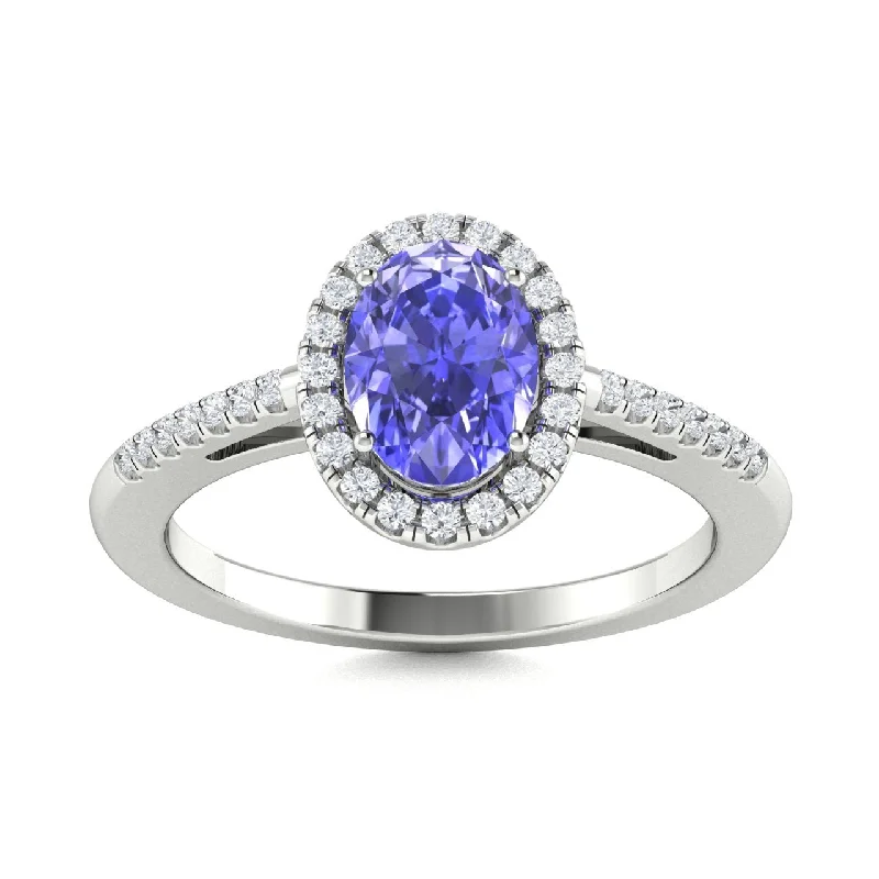 Engagement rings with asymmetrical designs for couples seeking non-traditional styles -18kt Gold Oval Shaped Tanzanite and Diamond Ring (Tanzanite .75ct Diamonds 0.10cts)