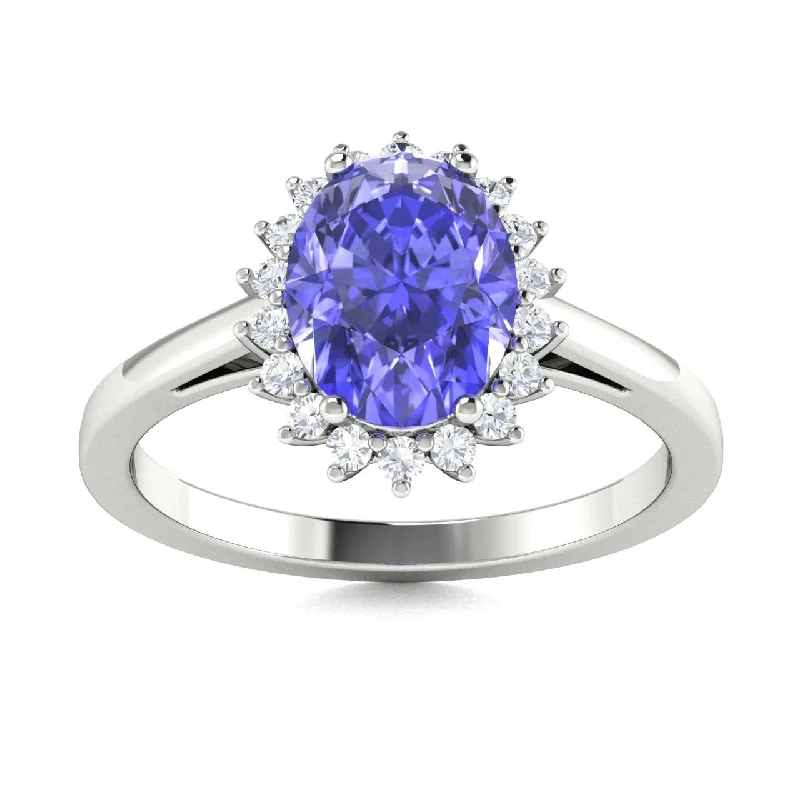 Classic solitaire engagement rings with platinum or white gold bands for elegance -18kt Gold 'Princess Diamond Concept' Tanzanite Ring (Tanzanite 3.75cts White Diamonds 0.25 cts)