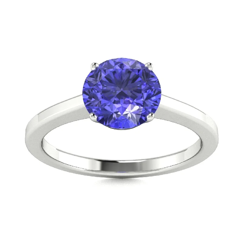 Engagement rings with diamond sidestones for added brilliance and a modern touch -18kt Gold Round Brilliant Cut Solitaire Tanzanite Ring (Tanzanite 3.00ct)