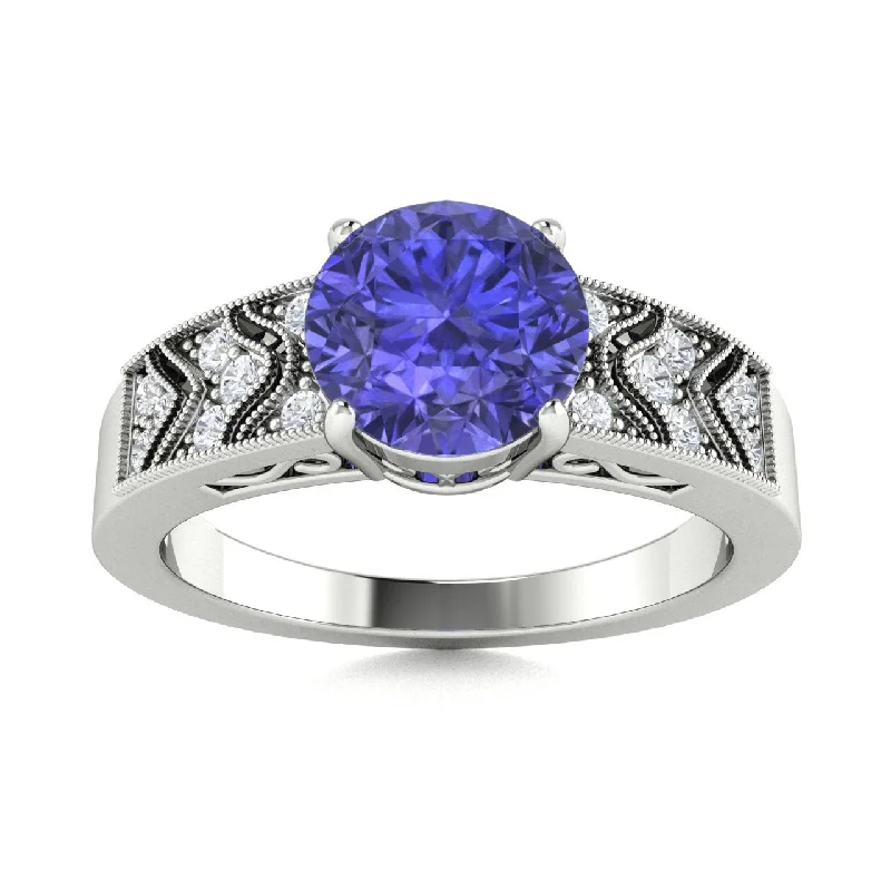 Antique engagement rings with intricate metalwork and heirloom-quality appeal -18kt Gold Round Brilliant Tanzanite and Diamond Ring (Tanzanite 3.00 cts. White Diamonds 0.20 cts.)