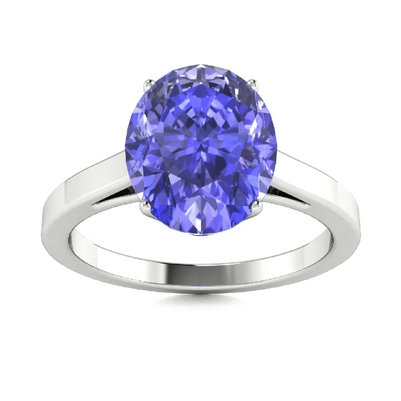 Engagement rings with innovative designs featuring tension or floating diamond settings -18kt Gold Solitaire Tanzanite Ring (Tanzanite 6.00ct)