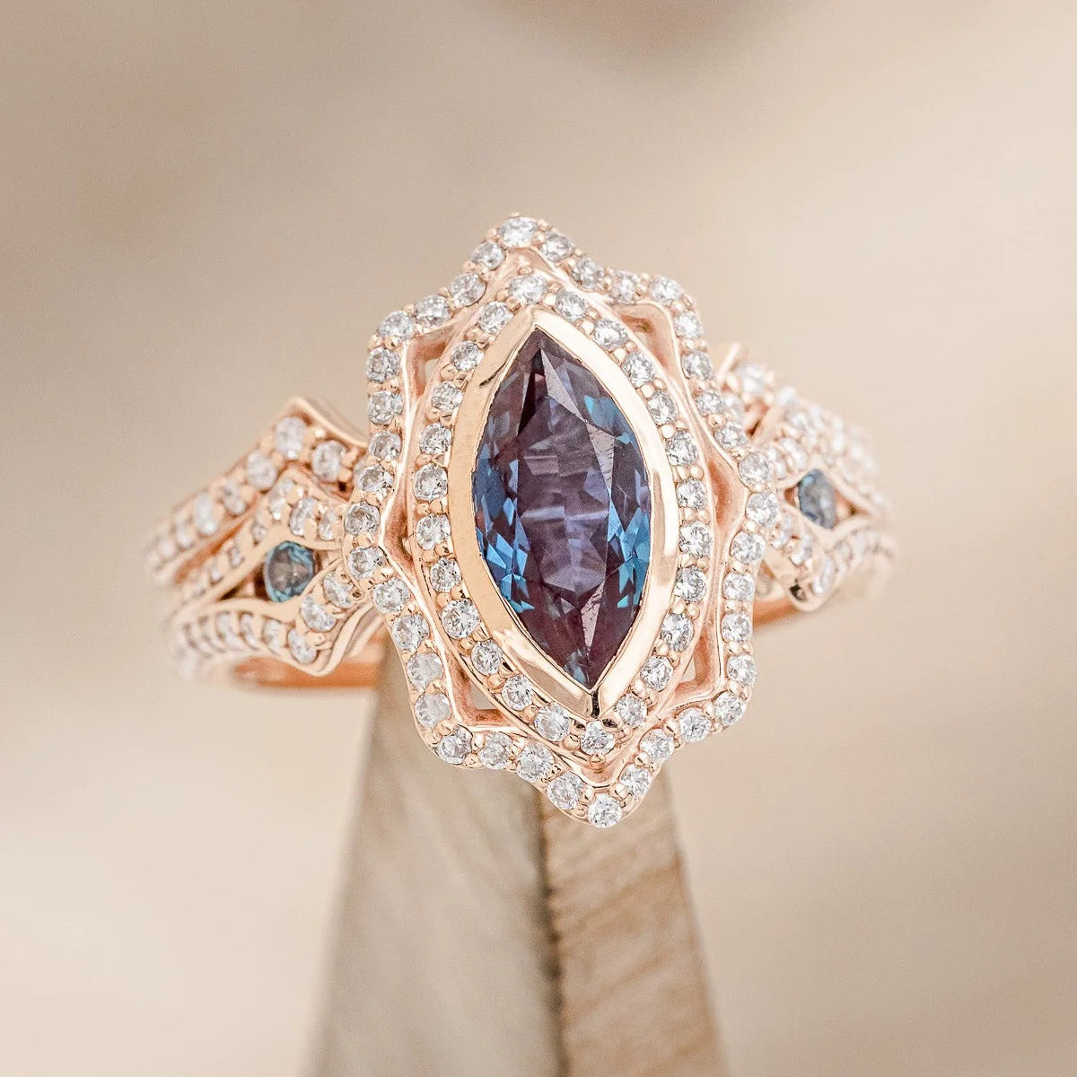 Affordable engagement rings with moissanite stones for a diamond-like alternative -"ADELE" - MARQUISE LAB-GROWN ALEXANDRITE ENGAGEMENT RING WITH ALEXANDRITE ACCENTS, DIAMOND HALO & TRACER