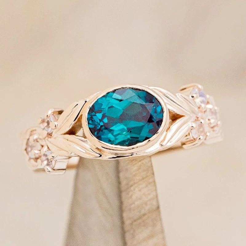 Engagement rings with hidden diamonds for a surprise sparkle on the band -"ELORA" - OVAL CUT LAB-GROWN ALEXANDRITE ENGAGEMENT RING WITH MOONSTONE ACCENTS