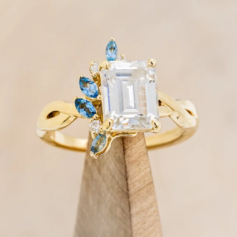 Custom engagement rings with ethically mined diamonds for an eco-conscious wedding -"GABRIELLA" - EMERALD CUT MOISSANITE ENGAGEMENT RING WITH AQUAMARINE ACCENTS IN A TWISTED BAND