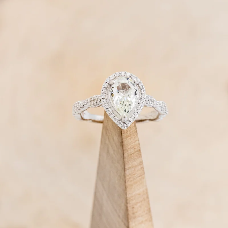 Engagement rings with bezel-set diamonds for sleek, contemporary looks and security -"KINLEY" - PEAR CUT MOISSANITE ENGAGEMENT RING WITH DIAMOND HALO & ACCENTS