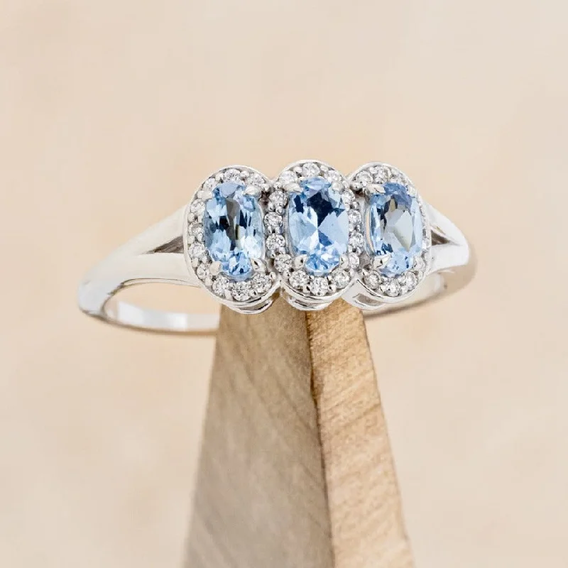 Modern engagement rings with geometric diamond cuts for contemporary, minimalist appeal -"MERCILLA" - THREE STONE OVAL AQUAMARINE ENGAGEMENT RING WITH DIAMOND ACCENTS