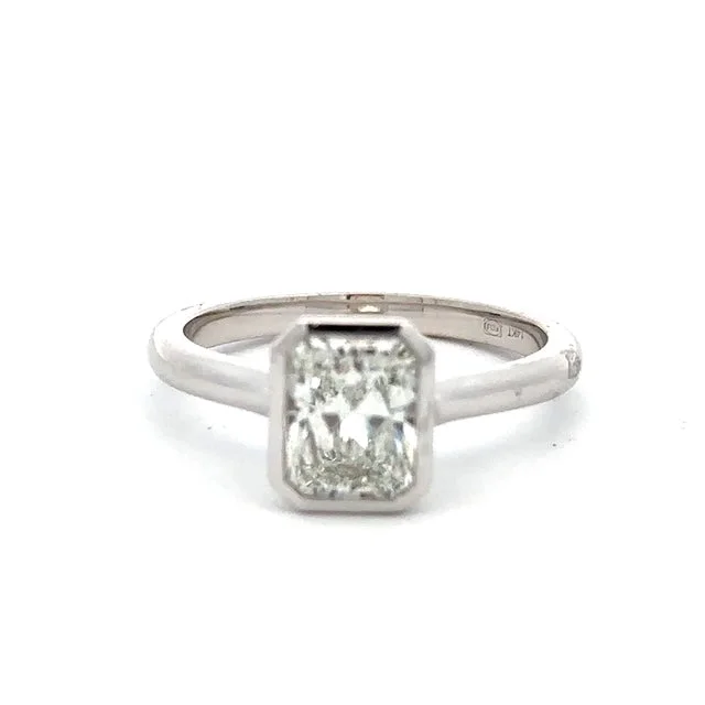 Customizable engagement rings with engraving options for personalized wedding jewelry -Radiant Diamond Engagement Ring