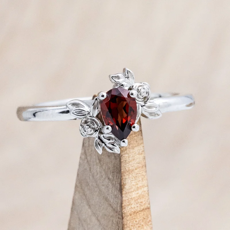 Elegant engagement rings with oval-shaped diamonds for an elongated, flattering appearance -"ROSA" PETITE - PEAR CUT MOZAMBIQUE GARNET ENGAGEMENT RING WITH FLOWER ACCENTS