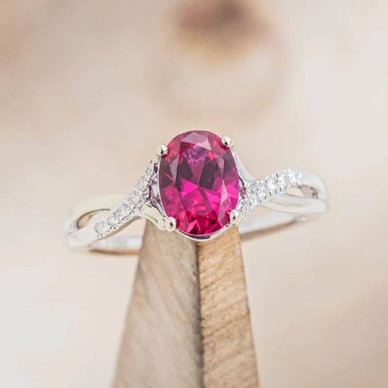 Non-diamond engagement rings with alternative gemstones like moissanite or aquamarine -"ROSLYN" - OVAL CUT LAB-GROWN RUBY ENGAGEMENT RING WITH DIAMOND ACCENTS