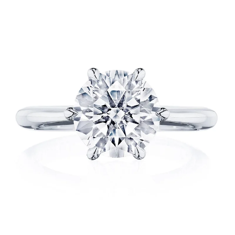 Modern engagement rings with tension settings for a sleek, floating look -Round Solitaire Engagement Ring