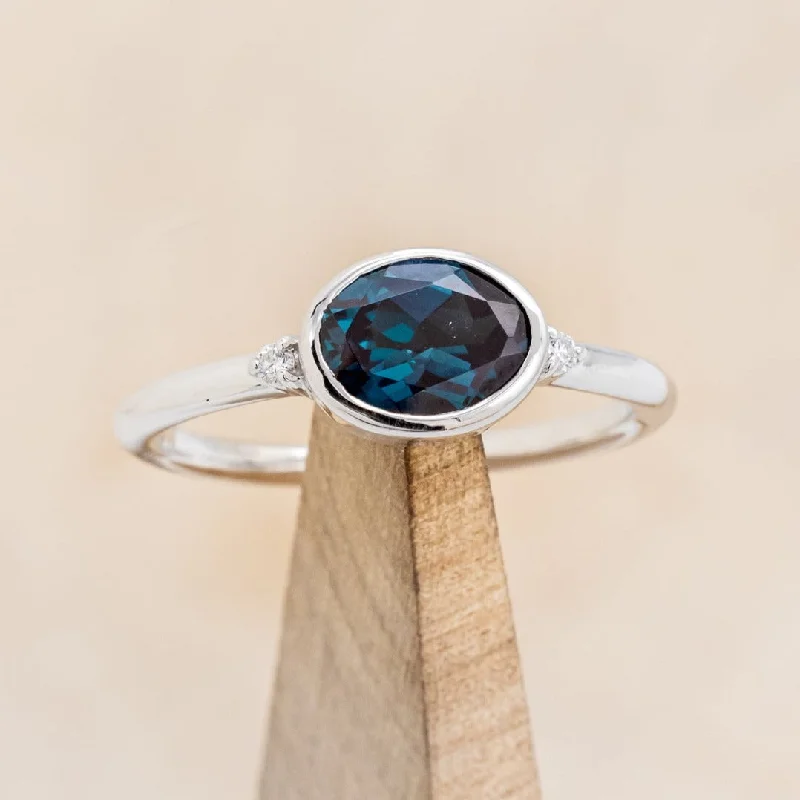 Stunning engagement rings with pear-shaped diamonds for a unique and romantic appeal -"SASI" - OVAL LAB-GROWN ALEXANDRITE ENGAGEMENT RING WITH DIAMOND ACCENTS