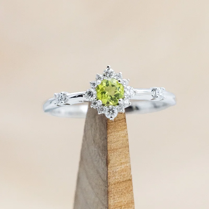 Unique engagement rings with floral settings for nature-inspired, feminine designs -"STARLA" - ROUND CUT PERIDOT ENGAGEMENT RING WITH STARBURST DIAMOND HALO