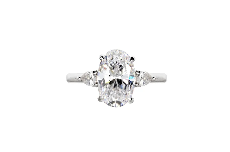 Engagement rings with three-stone settings symbolizing past, present, and future love -The Anastasia Ring (2.6 Carat)