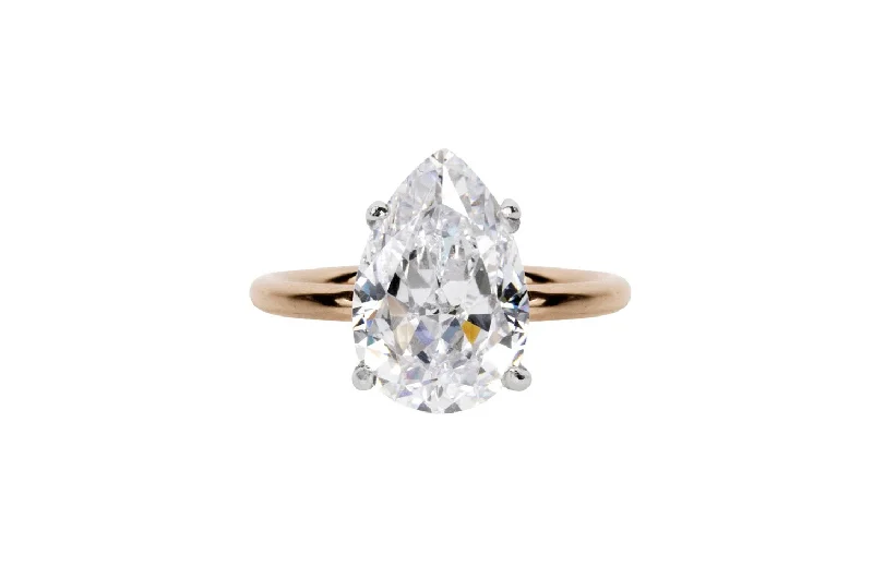 Stunning engagement rings with pear-shaped diamonds for a unique and romantic appeal -The Kira Ring (4.1 Carat)