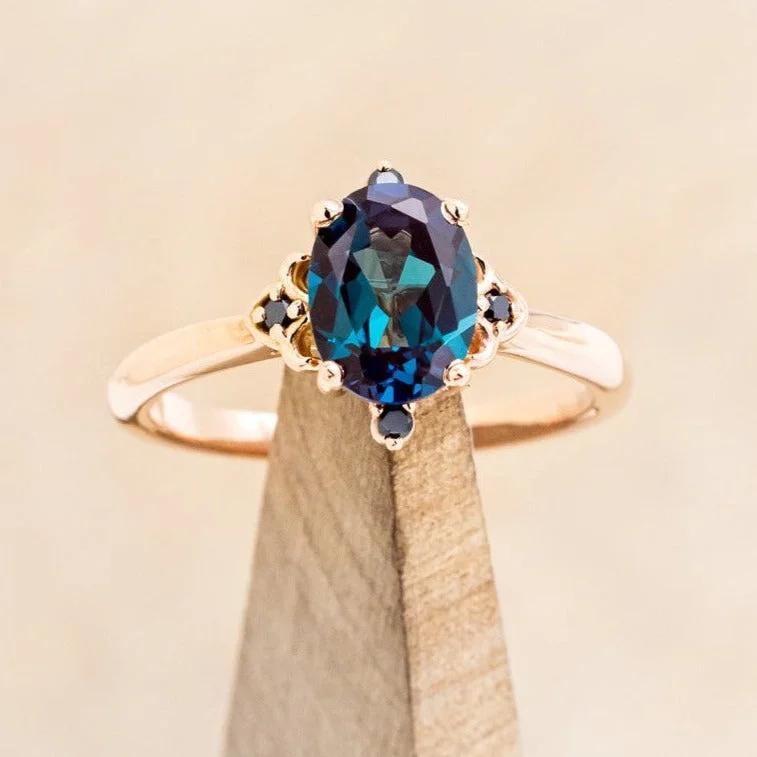 Engagement rings with vintage-style settings featuring intricate filigree and detailing -"ZELLA" - OVAL CUT LAB-GROWN ALEXANDRITE ENGAGEMENT RING WITH BLACK DIAMOND ACCENTS