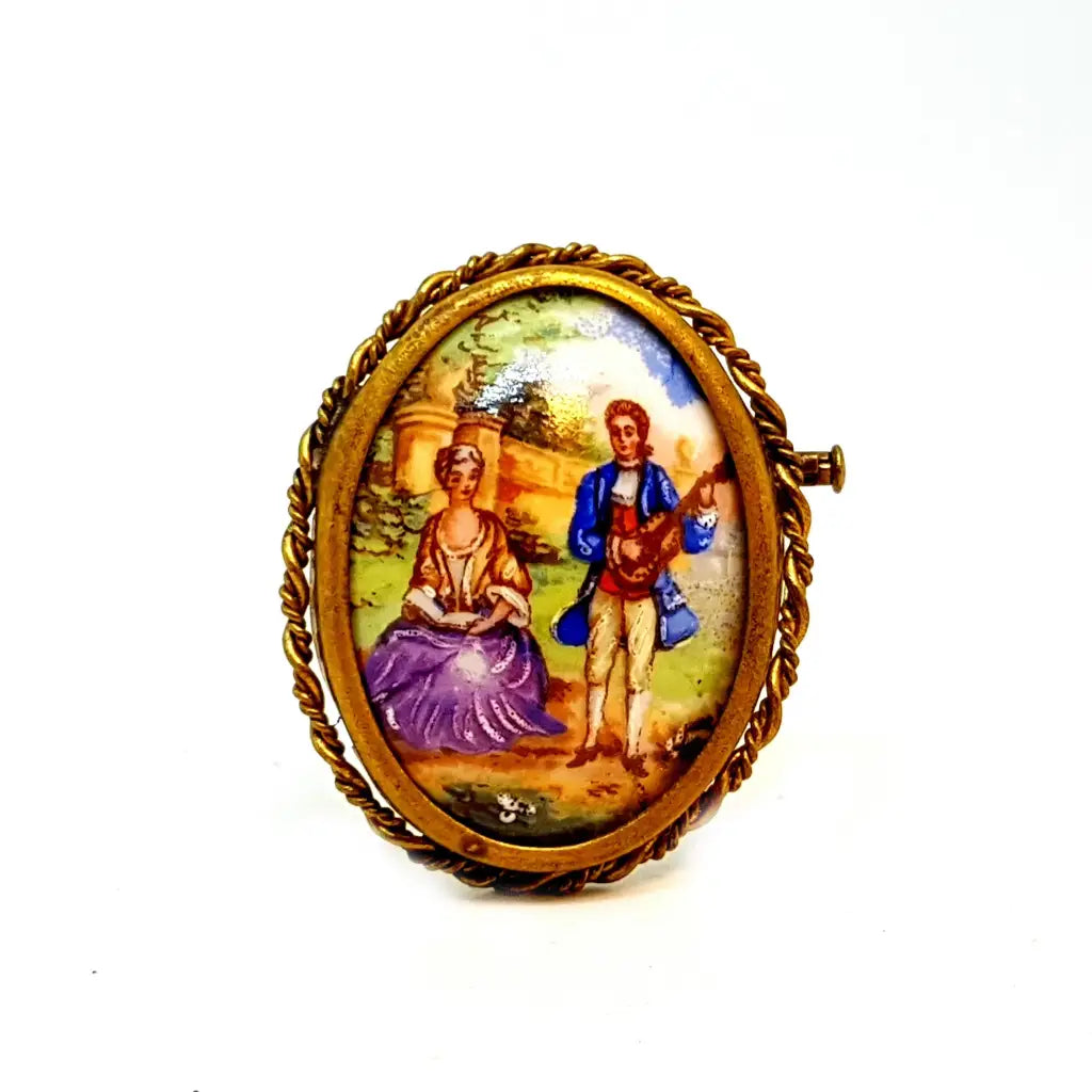 Brooches and pins featuring topaz for blue shine -Antique Limoges porcelain brooch with a romantic scene.