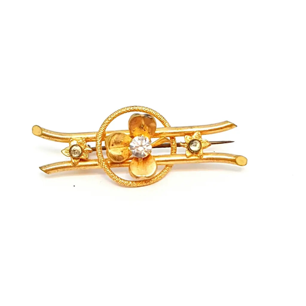 Bright brooches and pins with mixed stone dazzle -Antique 3-leaf clover brooch. Gold jewelry with white rhinestones.