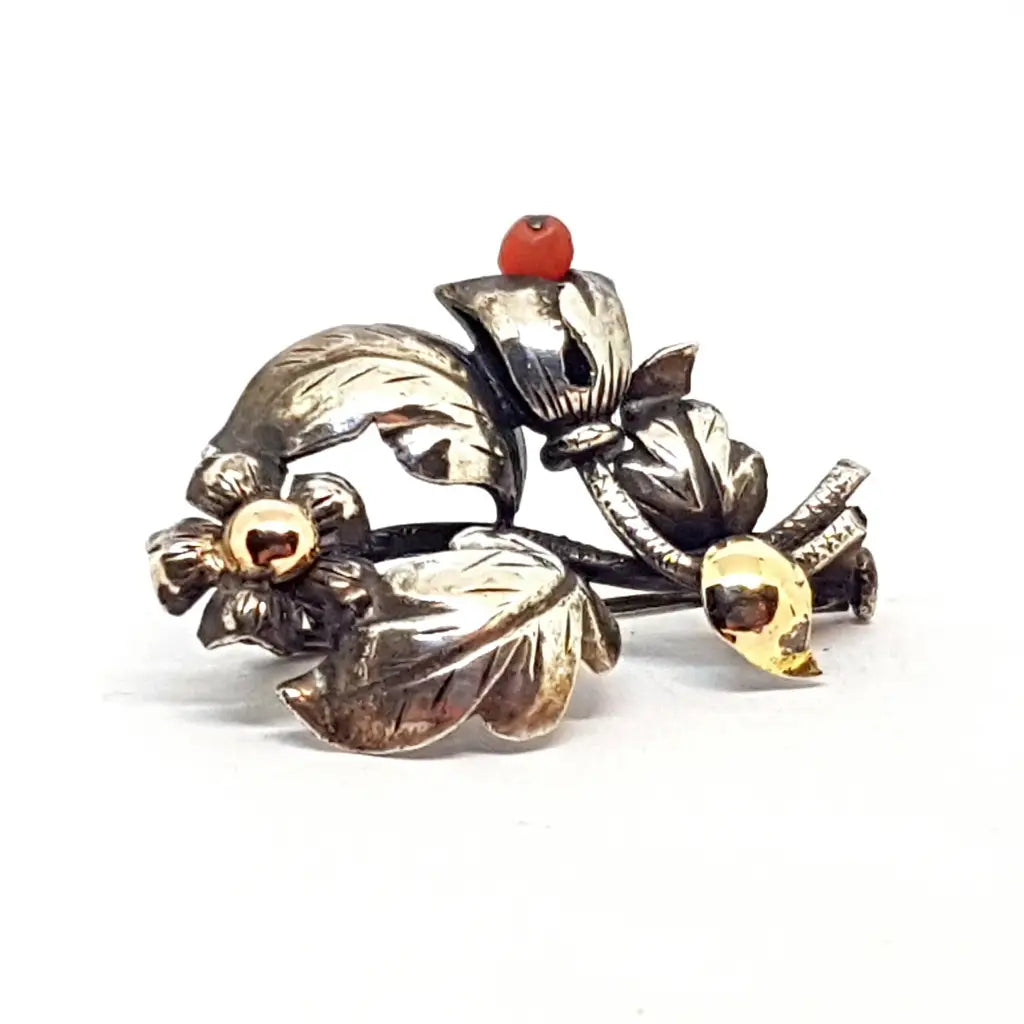 Brooches and pins featuring sunstone for warm shine -Antique coral brooch. Silver, gold and coral brooch. Bouquet of flowers.