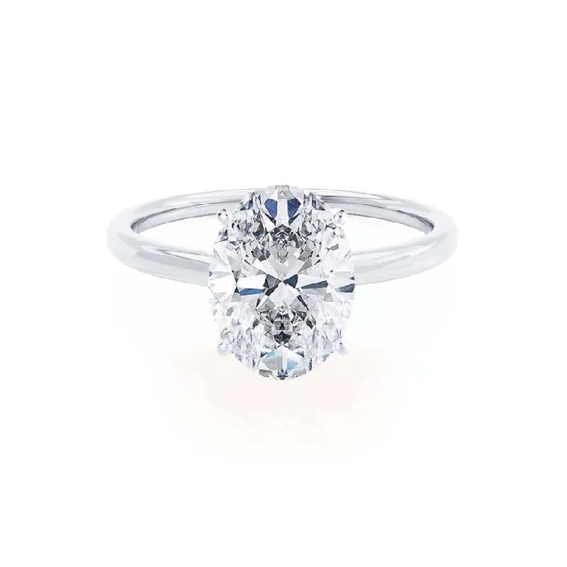 Diamond Rings with Sapphire Pairing for Brilliance-LULU - Oval Diamond Petite Solitaire 18k White Gold Engagement Ring